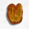 Oreja de crema con pistacho